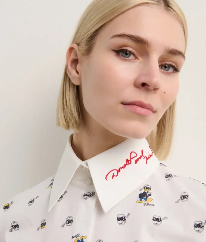 DISNEY X KL ALL-OVER PRINT BLUZ DISNEY X KL ALL-OVER PRINT BLUZ