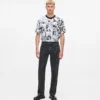 Düz kesim, tüm yüzeyi monogram desenli kot pantolon Düz kesim, tüm yüzeyi monogram desenli kot pantolon