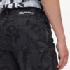 Düz kesim, tüm yüzeyi monogram desenli kot pantolon Düz kesim, tüm yüzeyi monogram desenli kot pantolon